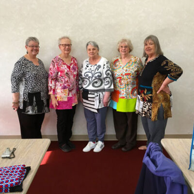 Take Four Tunics created on a Bettendorf Library Sewing Day with Iowa friends Linda P, Cousin Linda, Sandy, and Rita. We had a great time cutting up, piecing, and sharing T-shirt parts with each other.